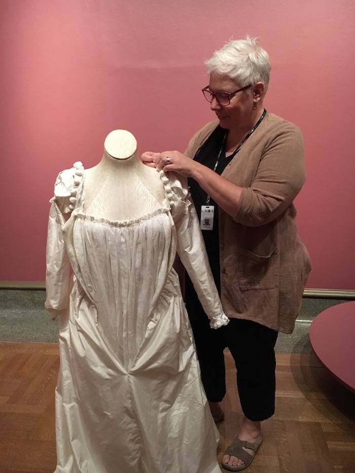 Elizabeth Hopkin works on the Titian dress re-creation