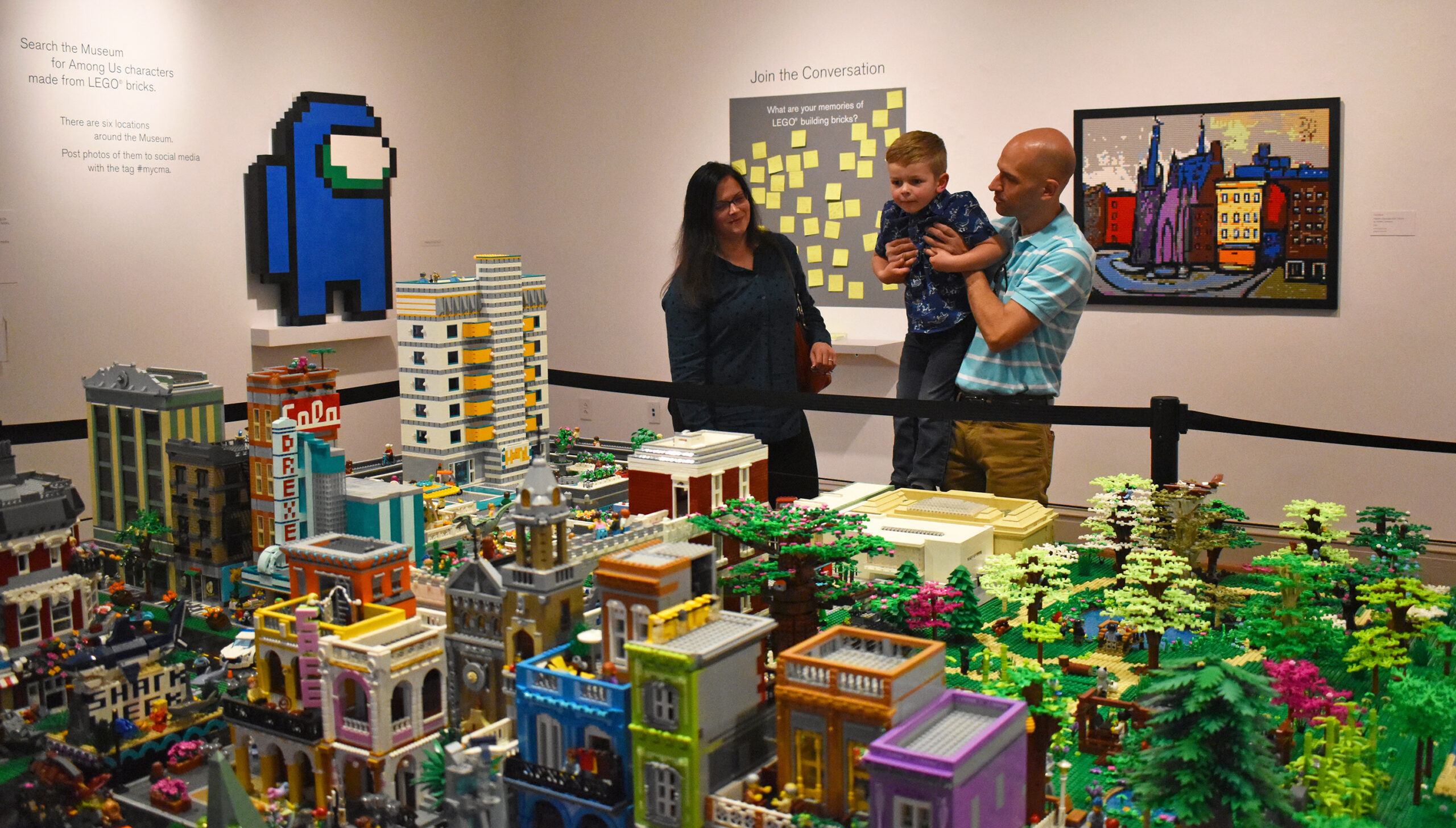 Visitors enjoying Think Outside the Brick: The Creative Art of LEGO® 2022