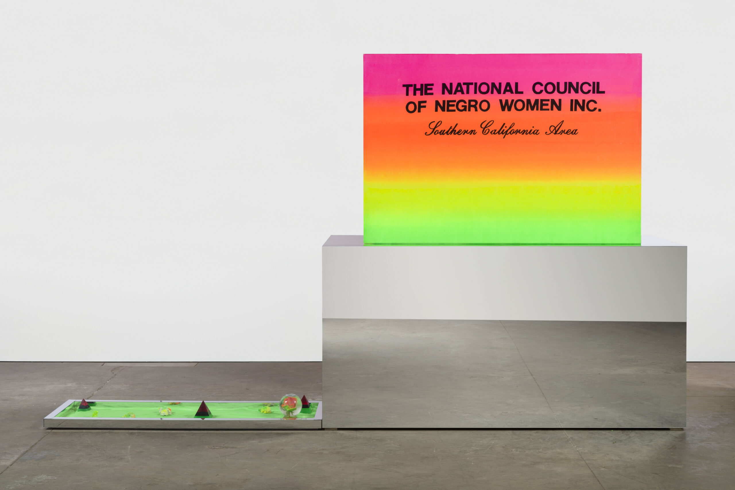 Lauren Halsey, The National Council of Negro Women Inc., 2020, Acrylic, mirror, sand, and objects on foam and wood, 94 x 158 x 45 Inches, Object: Courtesy the artist and David Kordansky Gallery, Los Angeles, CA