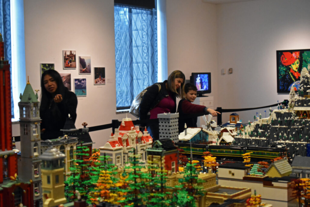 Visitors enjoying Think Outside the Brick: The Creative Art of LEGO® 2022