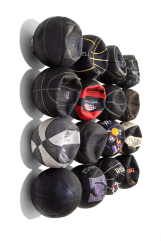 Tyrrell Winston, A Panther Has No Stripes, 2022. Used basketballs, liquid plastic, steel, and epoxy. 36 x 39 x8 inches. Photo by PD Rearick, courtesy of the artist and Library Street Collective