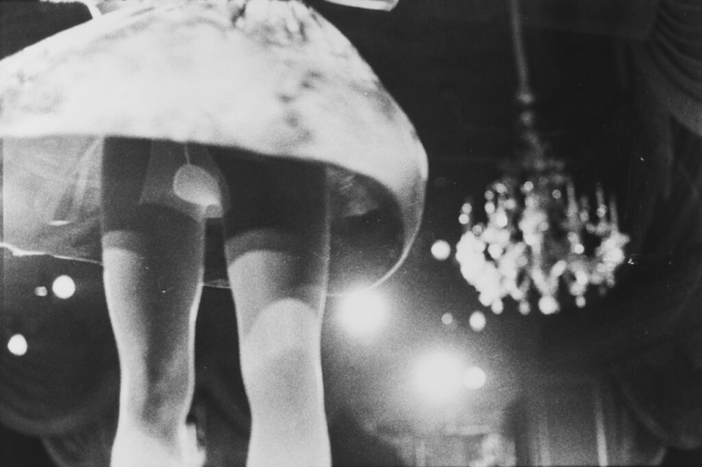 Zoe Leonard, View from Below: Geoffrey Beene Fashion Show, 1990. Gelatin silver print. Museum Purchase, Derby Fund