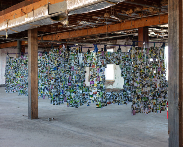 Brett Davis, Sayaka Saito Davis, and Toko Davis, Love Like an Ocean, 2023. Used clothing, acrylic, tape, glitter on photographs. 72x72x360 inches